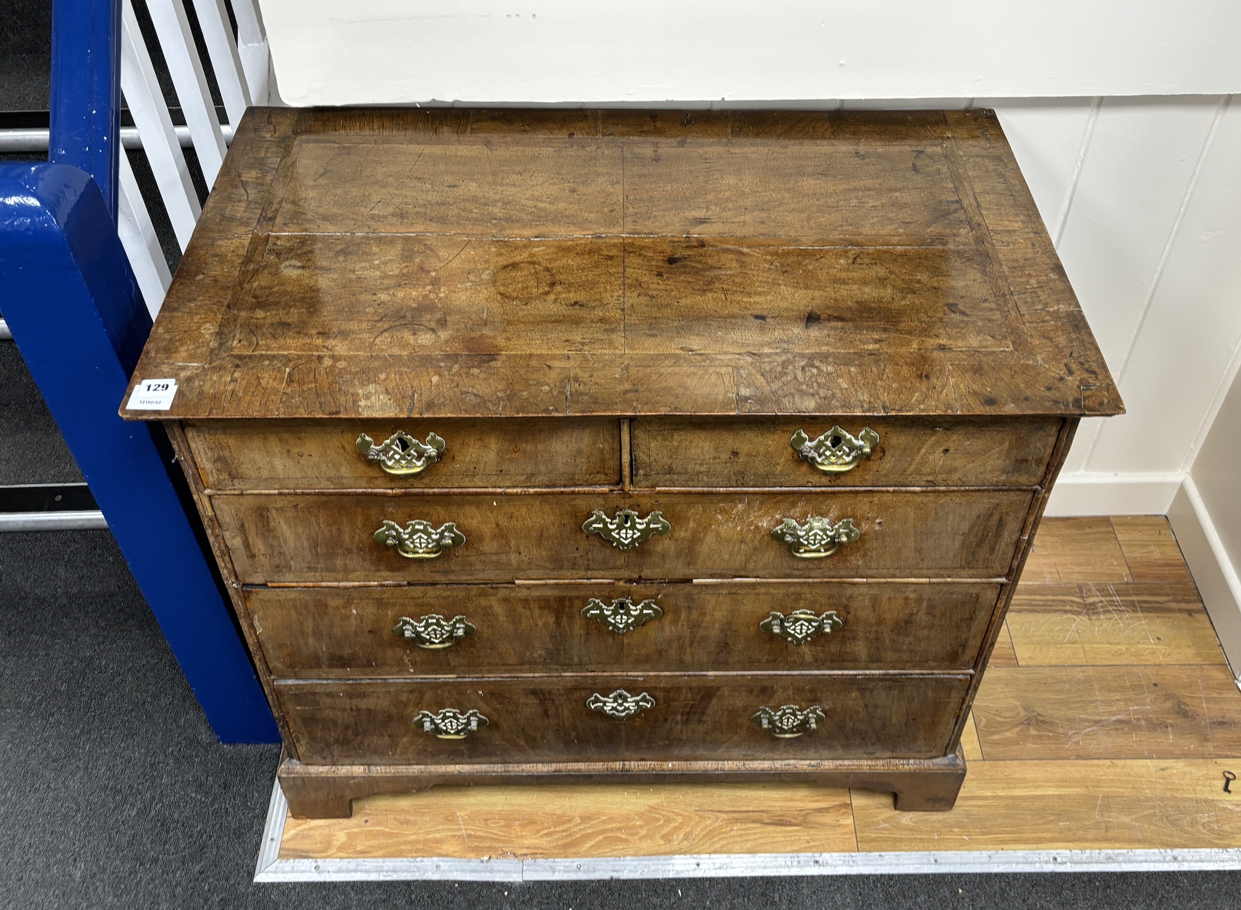 An 18th century feather banded walnut chest of two short and three long drawers, width 96cm, depth 55cm, height 82cm